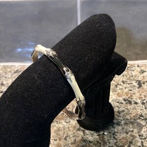 Beautiful black, white, and silver tone enamel bracelet